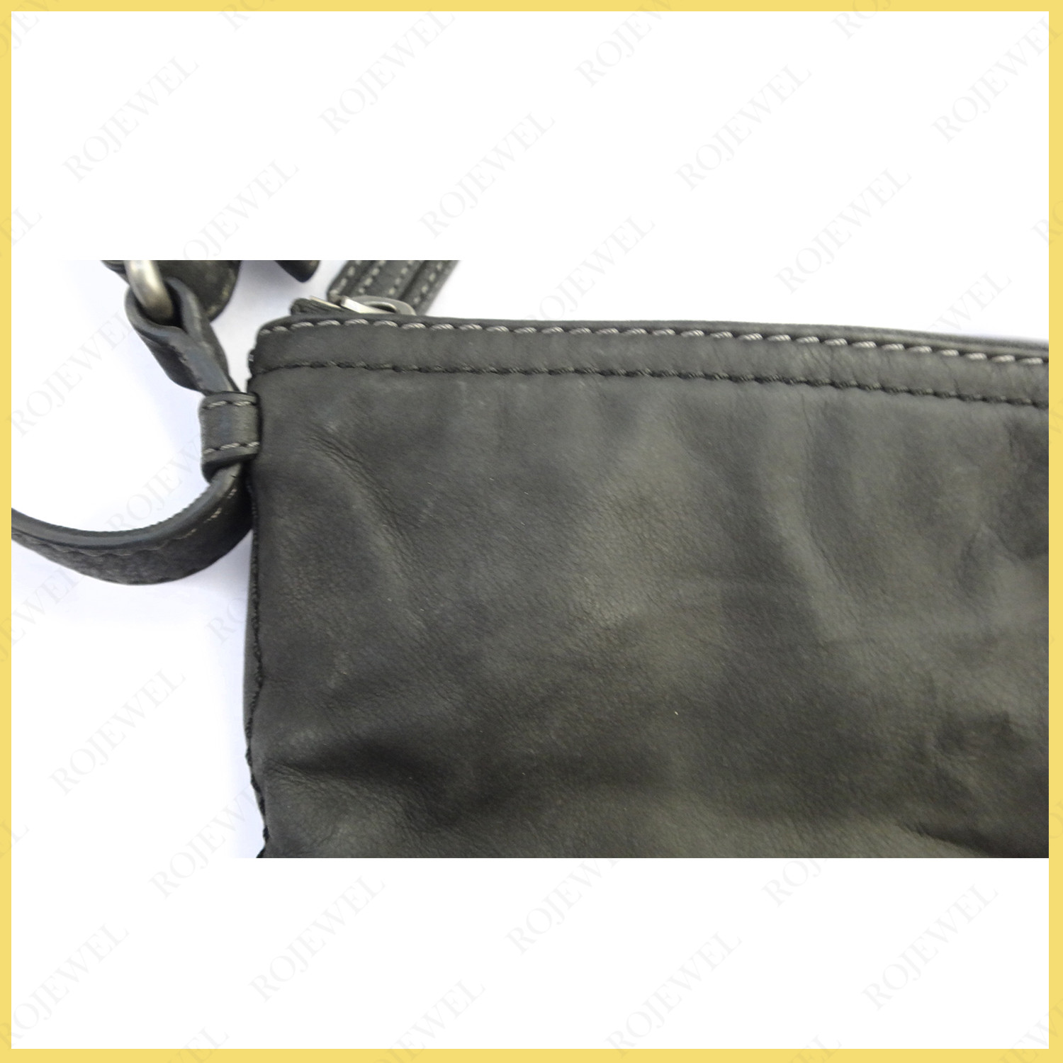 羅意威（Loewe）包包整體清潔前后對(duì)比